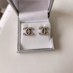 Chanel CC Silver earrings.